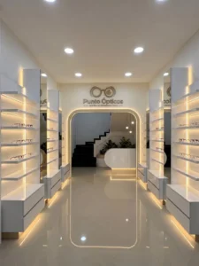 Exhibidores iluminados para local comercial de óptica - Madertino